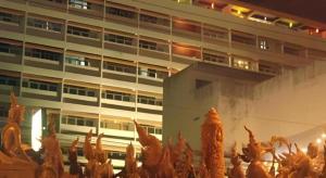 a building with a lot of food in front of it at Ubon Hotel in Ubon Ratchathani