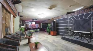 TV a/nebo společenská místnost v ubytování Sahid Kawanua Hotel