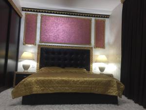 Ein Bett oder Betten in einem Zimmer der Unterkunft Hotel Chamishki