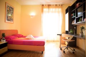 A television and/or entertainment centre at Chat&Chill Vatican Apartment