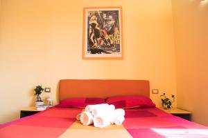A bed or beds in a room at Chat&Chill Vatican Apartment