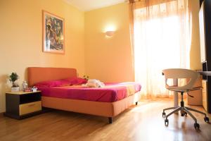 A bed or beds in a room at Chat&Chill Vatican Apartment