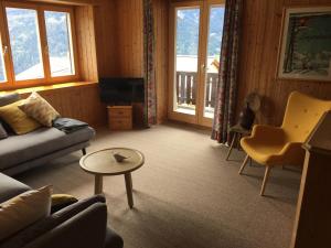 Χώρος καθιστικού στο Sonnige Wohnung mit Aussicht Region Lenzerheide