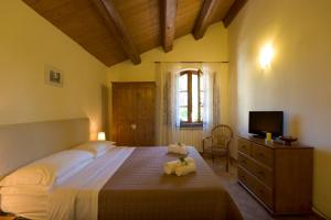 Postel nebo postele na pokoji v ubytování B&B Cristina