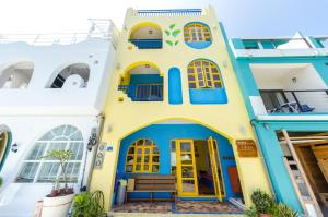 a colorful house in positano positano italy at Shu Lan Yang Ye in Manzhou