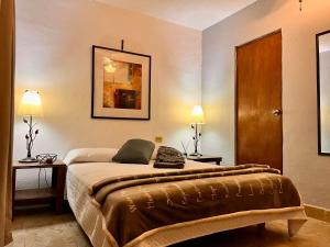 Ένα ή περισσότερα κρεβάτια σε δωμάτιο στο Hotel 305