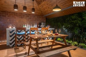 Posezení v ubytování The Den by Vieda - Part of StayVista