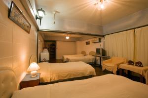 Posteľ alebo postele v izbe v ubytovaní Surfside Bed & Breakfast