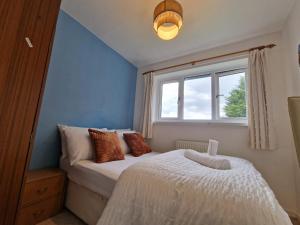 Postel nebo postele na pokoji v ubytování A spare room in a quite cul de sac