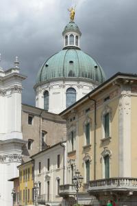 a building with a dome on top of it at Casa della Regina, near Lake Garda in Montichiari