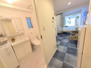 a bathroom with a toilet and a sink at 近藤ビル in Tokyo +87 photos