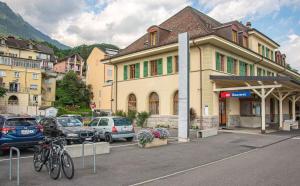 a building with bikes parked in a parking lot at Bouveret Bay - The Balcony in Bouveret