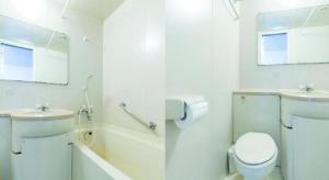 a white bathroom with a toilet and a sink at Tabist Joetsu Central Hotel Takada Nakamachi in Joetsu +53 photos