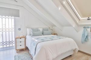 En eller flere senge i et værelse på Casa de Brinero