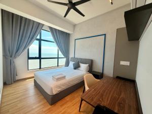 En eller flere senge i et værelse på Newston Family City View 2 Bedrooms + 23 billeder