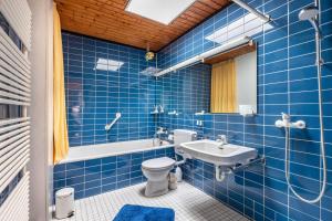 Phòng tắm tại Sonniger Architektenbungalow 128 qm