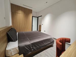 Postel nebo postele na pokoji v ubytování Minerva Aparthotel Hanoi