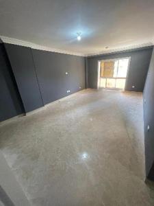 a large empty room with a window in a house at الزقازيق فلل الجامعه برج رويال بلازا in Kafr az Zand