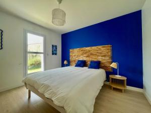 Postel nebo postele na pokoji v ubytování Villa des Ilâtes