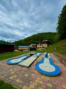 a group of trampets on a brick ground at Poráč Park in Poráč