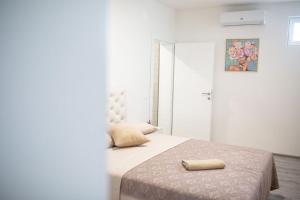 Ένα ή περισσότερα κρεβάτια σε δωμάτιο στο Vila la Vita +90 φωτογραφίες