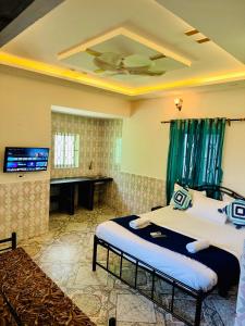 Postel nebo postele na pokoji v ubytování D Guest House