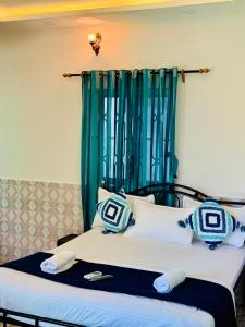 Postel nebo postele na pokoji v ubytování D Guest House + 15 fotografií