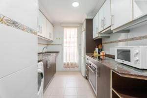 Η κουζίνα ή μικρή κουζίνα στο Encantador apartamento en la playa