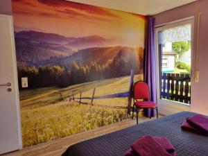a bedroom with a mural of a field and fence at Gruppenunterkunft-Klein-Holland-Harz-aussergewoehnlich-und-einzigartig-mit-grossartiger-Unterhaltung-fuer-jedes-Alter-fuer-bis-zu-24-Personen in Herzberg am Harz