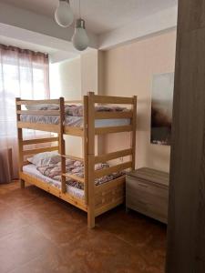 a bedroom with two bunk beds in a room at 2-room Apartment NFT Gudauri Penta 404 in Gudauri +17 photos