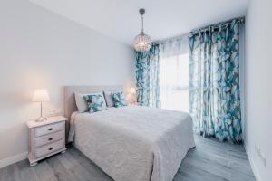 Giường trong phòng chung tại Vitta Natur - 3-bedroom luxury apartment with SPA +36 ảnh