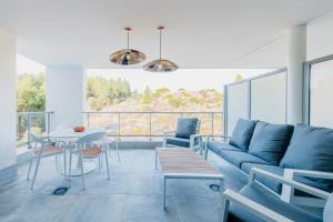 Khu vực ghế ngồi tại Vitta Natur - 3-bedroom luxury apartment with SPA