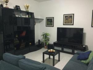 Et tv og/eller underholdning på Elegante Appartamento Palermo