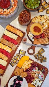 a table topped with lots of different types of food at Chateau Mariposa in Spring Hill