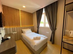 Ένα ή περισσότερα κρεβάτια σε δωμάτιο στο Royal Guest House RGH +45 φωτογραφίες