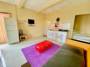 Kuchyň nebo kuchyňský kout v ubytování villa puncak ressort