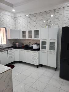 Kuchyň nebo kuchyňský kout v ubytování ISeedy Apartment