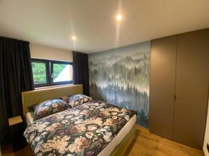 Postel nebo postele na pokoji v ubytování Apartmány La Torretta