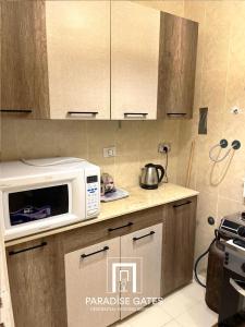 Η κουζίνα ή μικρή κουζίνα στο Paradise Gates Madinaty