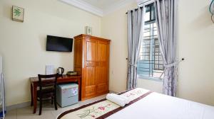Μια τηλεόραση ή/και κέντρο ψυχαγωγίας στο Areca Homestay