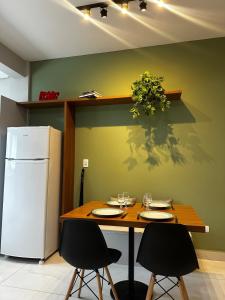 Кухня или мини-кухня в Studio Aconchego Poços - Minimalista e bem localizado
