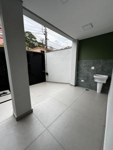 Ванная комната в Studio Aconchego Poços - Minimalista e bem localizado