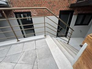 a set of stairs in front of a brick building at Østerbrogade 49 in Holstebro