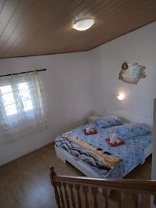 Postel nebo postele na pokoji v ubytování Apartments "Sun-sea"