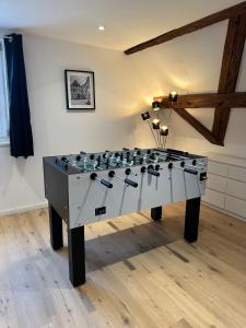 a large game table in a room at Juraperle - Historisch und modern - Wohnung 2 in Bad Staffelstein