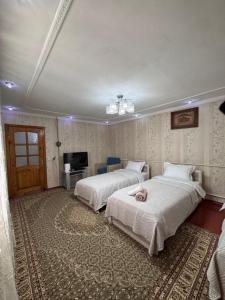 Postel nebo postele na pokoji v ubytování Cozy Stay Guest House