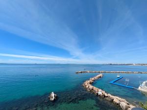 an aerial view of a large body of water at Eagle & Dolphin Holiday Home in Taranto