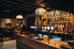 Sohvabaar või baar majutusasutuses Coaching Inn