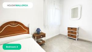 Postel nebo postele na pokoji v ubytování Villa Blanca + 1 fotografie