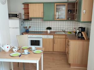 Η κουζίνα ή μικρή κουζίνα στο Ferienwohnung Amelie